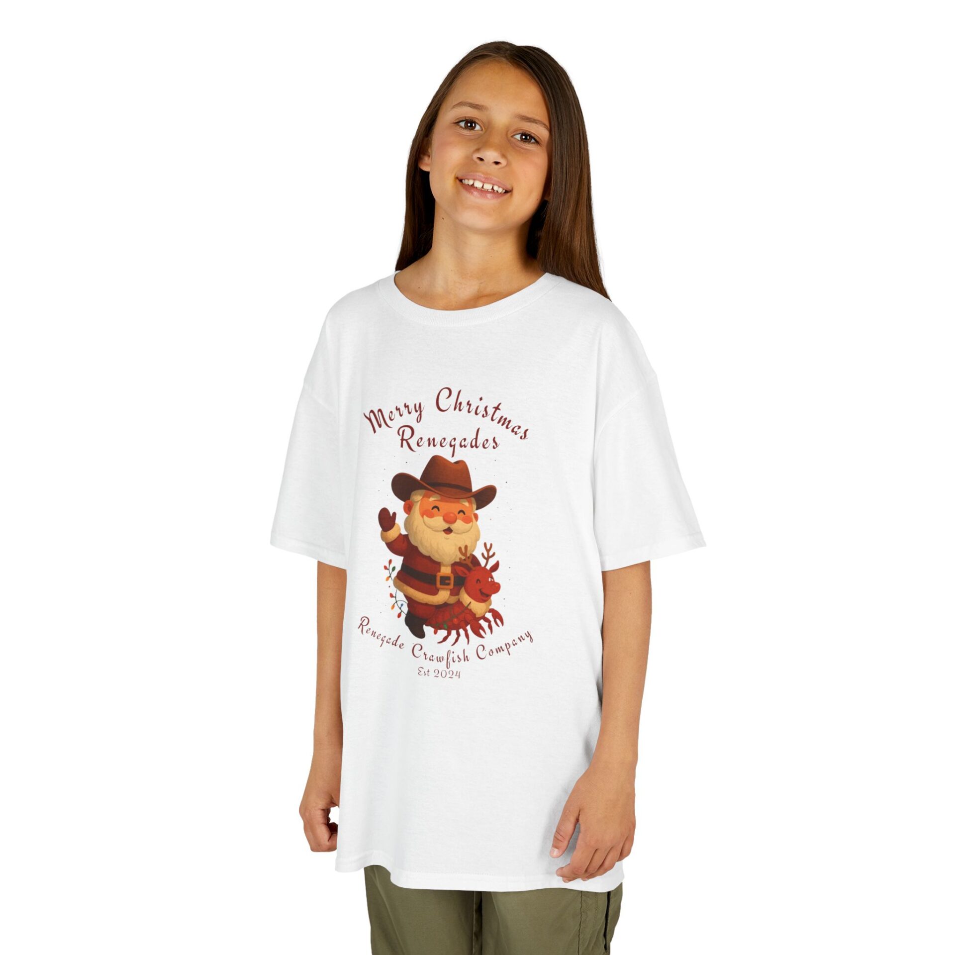 Girl wearing a white oversized t-shirt with a cute turkey and Thanksgiving message.