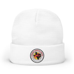 White beanie hat with a colorful circular logo on the cuff.
